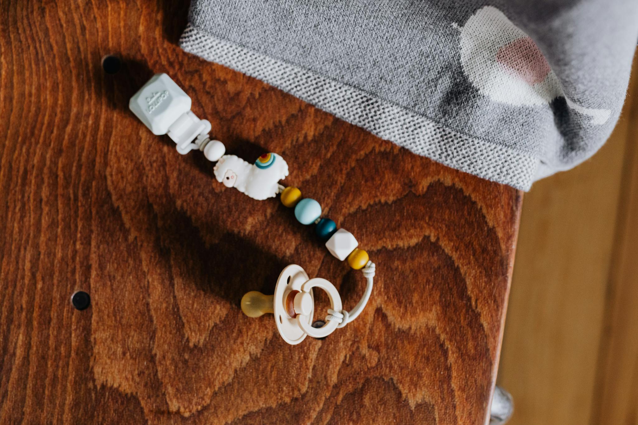A Vibrant Baby Pacifier Clip With Beads A vibrant baby pacifier clip with beads